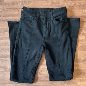 AMERICAN EAGLE NEXT LEVEL STRETCH BLACK BOOTCUT EANS SIZE 0 SHORT